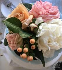 Delicious pink birthday cake with candle on cake stand near paper flowers isolated on grey. How To Make Fresh Flowers Safe For Cakes Sugar Sparrow