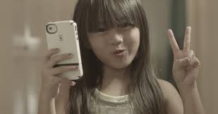 Cute Little Asian Girl Taking Picture