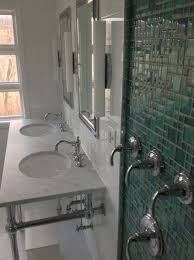 Walls are usually the part of the bathroom that is most exposed to the water, humidity, and moisture. Glass Tile Accent Wall Houzz