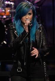 We love that she decided to do something edgy, but does it fit her? Demi Lovato Debuts Blue Hair Neon Lights On Leno