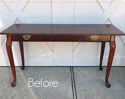 Crafted from wood in a dark cherry finish, it boasts a beveled edge top and 2 large shelves separated into three sections each. Queen Anne Sofa Table Makeover A Bonus Redo
