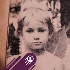 What does the symbolism of wells or dark holes represent in Murakami's work?