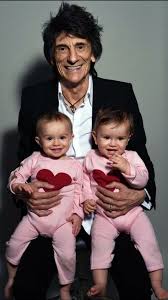 Ronnie Wood On His 70th Birthday Along With One Year Old Twin Daughters Ronnie Wood Rolling Stones Ron Woods