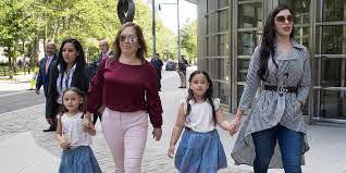 Authorities escort mexican drug lord joaquin el chapo guzman from a plane in ronkonkoma, ny on september 4, 2020. El Chapo S Daughters Attend His Trial For The First Time