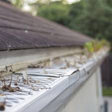 Reverse curve gutter guards (also called surface tension guards). How To Remove Gutter Guards Do It Yourself Pj Fitzpatrick