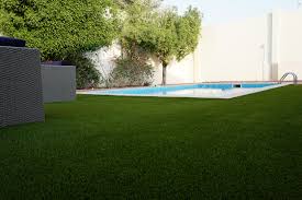 Stone slabs and fake grass balcony. Photos With Examples Of Artificial Turf Garden Playground Balcony Roof Terrace Etc