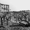 The painting itself is painted in shades of gray, invocative of dust, ash, and smoke that would hang in the air following such a destructive raid. Https Encrypted Tbn0 Gstatic Com Images Q Tbn And9gcttvgziuz Fsatj9 Hk7tqtx Bb Ip1abmyxsnrmgrghq88rx H Usqp Cau