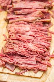 Place corned beef in instant pot, fatty side down and add beef broth and crushed garlic. Slow Cooker Guinness Corned Beef And Cabbage Big Flavors From A Tiny Kitchen