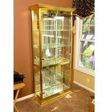 Maybe you would like to learn more about one of these? Lot Art Glass And Gold Display Cabinet