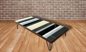 Makes me want to rush right out and find a piece of furniture to try this on. Ebern Designs Fava Coffee Table Wayfair Co Uk