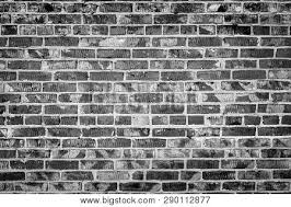 Black brick design elements in diagonal arrangement isolated on white background. Brick Wall Brick Texture Black And White Brick Wall Brick Background Grunge Wall Texture Background Texture Of Gray Brick Wall Surface Poster Id 290112877