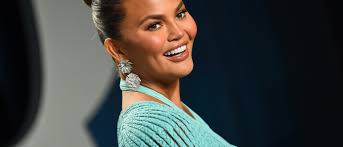Chrissy Teigen reveals baby bump after 2-year pregnancy loss
