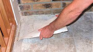 Then, using your sponge, apply the adhesive remover to the adhesive on your floor. How To Remove Vinyl Flooring