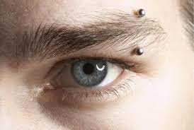 Your Guide To Eyebrow Piercings Straight From A Celebrity Piercer Eyebrow Piercing Men Eyebrow Piercing Guys Eyebrows