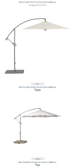 Cb2 Eclipse White Outdoor Umbrella Copycatchic Outdoor Umbrella Ikea Outdoor Backyard Furniture
