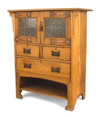 An authentic arts and crafts or mission oak period sideboard, server or buffet dates from about 1905. English Arts And Crafts Oak Cupboard