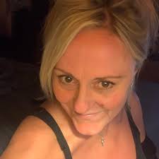 My dad, Roger McKenna. Middle row, center, between all the girls!