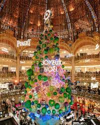12 Of The Most Magical Christmas Trees Around The World Christmas In Paris Storing Christmas Decorations Magical Christmas
