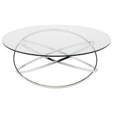 The concentric coffee table is a sophisticated play on an architectural optical illusion and dynamic from every angle of the room. Corel Coffee Table Burke Decor