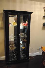 Expand your storage space with a china cabinet designed for storing spare dishes. Ulixis Crafts Dining Room Curio Cabinet