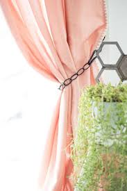 Old spoons are heated and bent to make an excellent holder for curtains. 3 Curtain Tie Backs You Can Make From Hardware Store Materials Hgtv