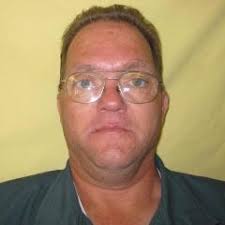 Son reacts to parole of father's killer