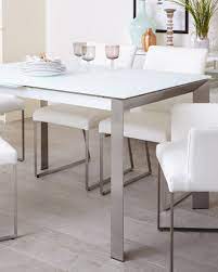 They do look elegant, and they go with most decors. White Frosted Glass Extending Dining Table With Brushed Steel Legs Danetti