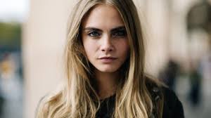 Cara poses in sporty activewear looks including a sweatshirt, sports bra and bodysui. Cara Delevingne Movies Wallpapers Wallpaper Cave