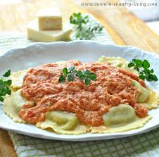 Crab Ravioli With Tomato Vodka Sauce Town Country Living Crab Ravioli Vodka Sauce Tortellini Recipes
