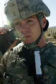 U.S. Army Staff Sgt. Matthew Cates radios the Joint