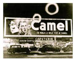 There's a low cloud cover. The Smoking Camel Sign Of New York Hand Eye Supply