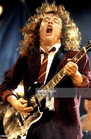 Find images of long hair. Photo Of Ac Dc And Angus Young And Ac Dc Angus Young Performing Live Angus Young Acdc Angus Young Angus