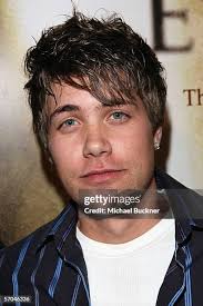 Contest winners Chad Sutter and Sara Sutter arrive at the premiere of...  News Photo