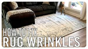 Placing a rug over an area of carpet can add style or prevent high traffic areas from becoming worn. How To Get Wrinkles Out Of Rugs Diy Youtube