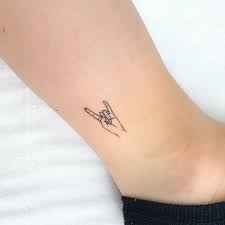 First Tattoo My Dudes Let The Rock N Roll Live On Tattoos Hand Tattoos Small Bff Tattoos