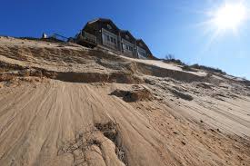 A luxury house is close to tumbling into Cape Cod Bay. Will anyone stop it?  | NEWS10 ABC
