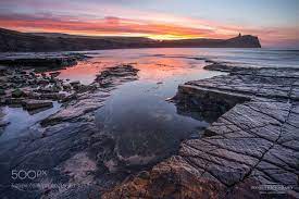 Sunrise At Kimmeridge Bay Dorset 500px By Matt Pinner Landscapes Landscapephotography Nature Travel Photography Pi Sunrise Dorset Landscape Photography