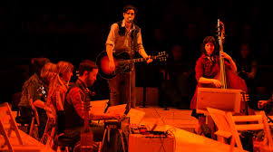 They went and built a skyscraper seven stories high, about as high as a buildin' orta grow. American Theatre How Daniel Kluger Put A Contemporary Twang On Oklahoma