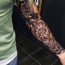 Some people have one tattoo, others have a few on different spots on their body. Compass And Rose Arm Sleeve And Bicep Tattoo Best Sleeve Tattoos For Men Cool Compass And Rose A Best Sleeve Tattoos Sleeve Tattoos Rose Tattoo Sleeve