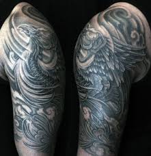The phoenix tattoo is represented as a big bird, close to an eagle. 60 Phoenix Tattoo Designs For Men A 1 400 Year Old Bird Half Sleeve Tattoos Black Phoenix Tattoo Sleeve Phoenix Tattoo Design
