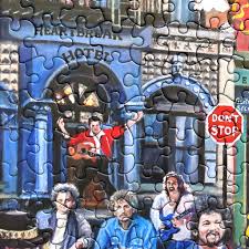Hey Puzzle Fans! Has anyone tried this nostalgic puzzle by artist Fred  Carrow? Rock & Roll Heaven (1000 pieces) is full of fun finds, symbols, and  iconic song references from these lost