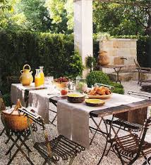 Veranda Magazine Outdoor Dining Table Stone Fountain Edited By Lb For L Painted Outdoor Furniture Veranda Magazine Patio
