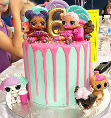 Alternating layers of strawberry & vanilla cake filled with whites chocolate ganache fresh strawberries and all the sprinkles! Lol Surprise Doll Birthday Cake Doll Birthday Cake 6th Birthday Cakes Birthday Surprise Party