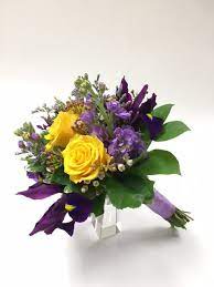 This Beautiful Spring Attendants Bouquet Has Purple Irises Lavender Stock Yellow Ro Purple Roses Wedding Yellow Wedding Flowers Bouquet Purple Bridal Bouquet