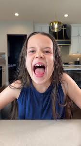 Daughter Pranks Dad with Glass of Water