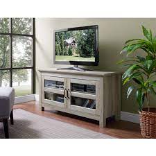 I like this tv console. Walker Edison 48 Inch Wood Tv Console White Oak Wq44cfdwo