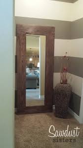 Glue the frame to the wall. Diy Floor Length Mirror Frame Tutorial Sawdust Sisters