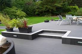 A Platform Deck Designed And Built With A Subtle Level Change Blends The Yard And Deck Into One Outdoor L Deck Designs Backyard Patio Deck Designs Patio Design
