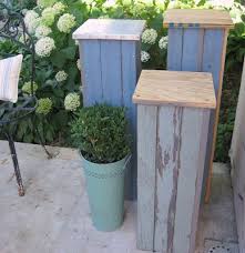 The wooden pallets are used as it is. Pedestals From Pallet Or Old Fence Wood Great For Patio Birdbath Stand Diy Plant Stand Old Fence Wood Diy Plant