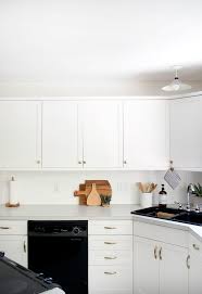 Tiles can protect the wall they cover, can be easily scrubbed of grease and grime, are much learning how to add a tile backsplash is well within the reach of anyone willing to put in a few days of diy work. How To Paint Your Tile Backsplash Brepurposed